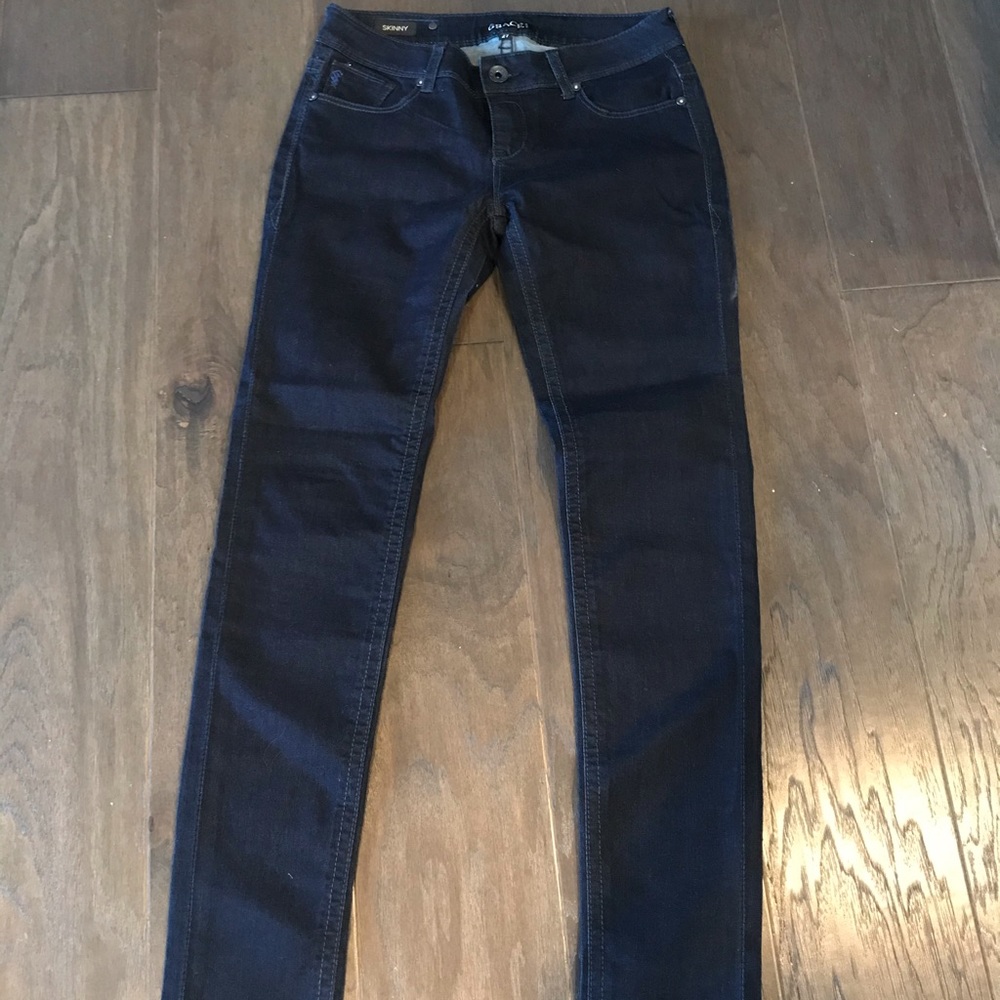 Never worn dark-wash boutique jeans; size 27